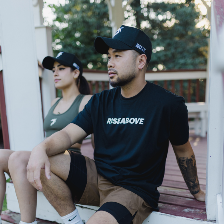 Clothing for a cause collection featuring workout tank tops, athletic hats, hoodies for a cause, and shirts for a cause that symbolize strength and resilience.