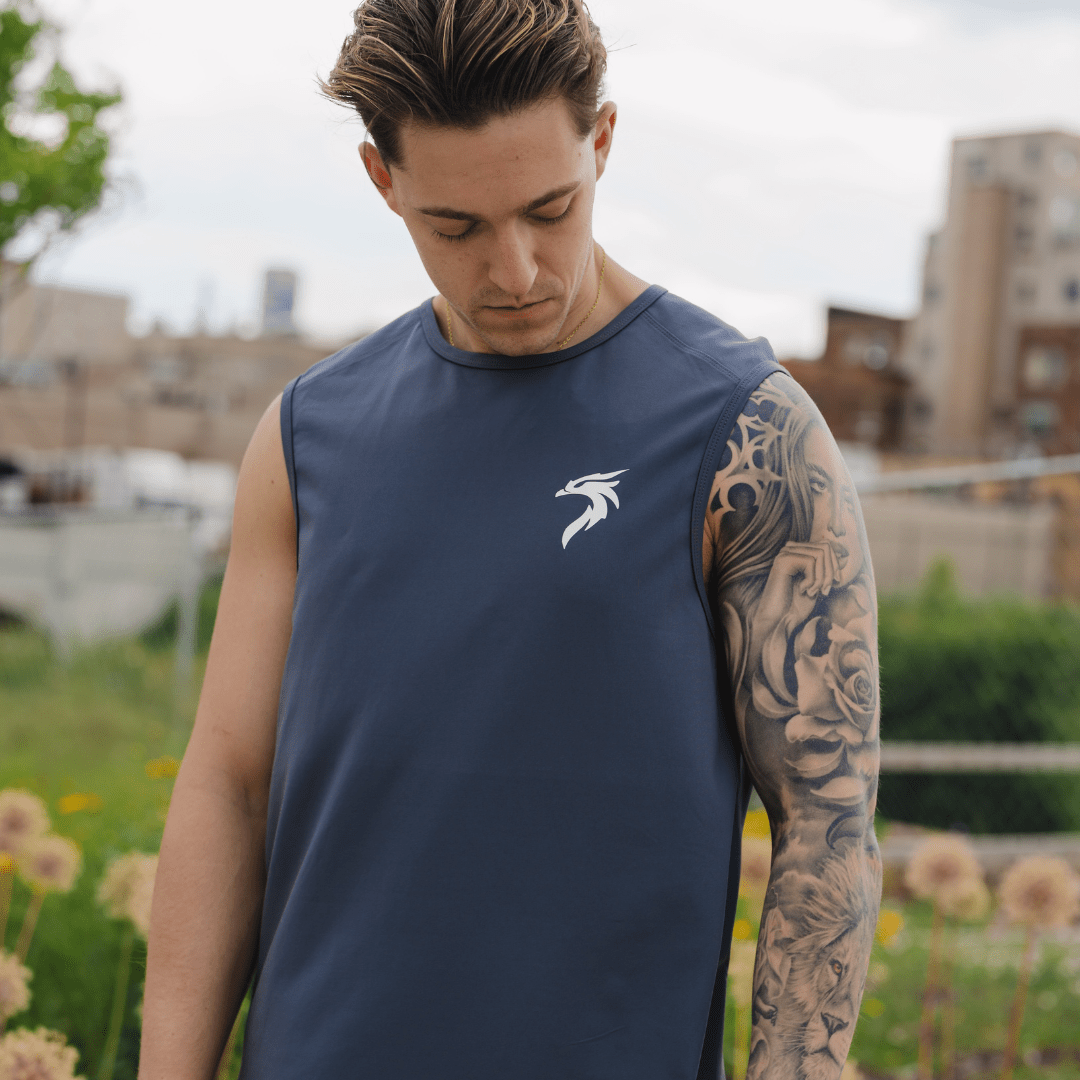 Men's athletic tank top in Arctic Blue, designed for flexibility, breathability, and performance, ideal for workouts and active wear.