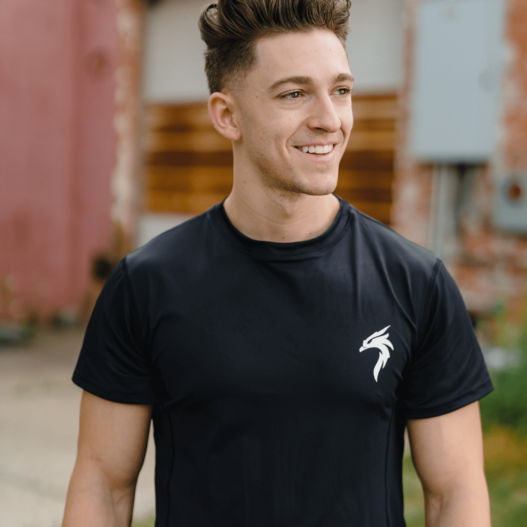 A collection of men’s performance shirts, including the Valor Performance Shirt, designed for resilience, comfort, and peak performance. Perfect for workouts and casual wear.