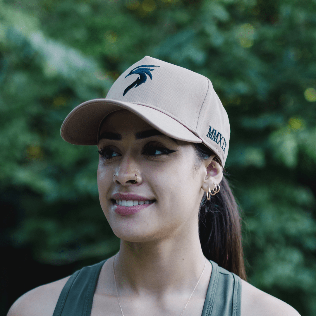 Women’s Riseabove Adjustable Hat with symbolic logo, representing resilience and personal growth.