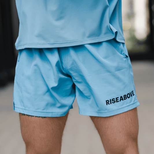 MEN'S VALOR PERFORMANCE SHORTS - ARCTIC BLUE - Riseabove Apparel Inc